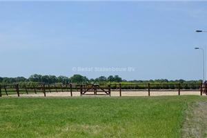 rijbak rond door rond houten omheining